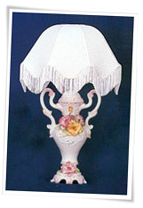 Capodimonte lamp and shade with double handled vase decorated with flowers